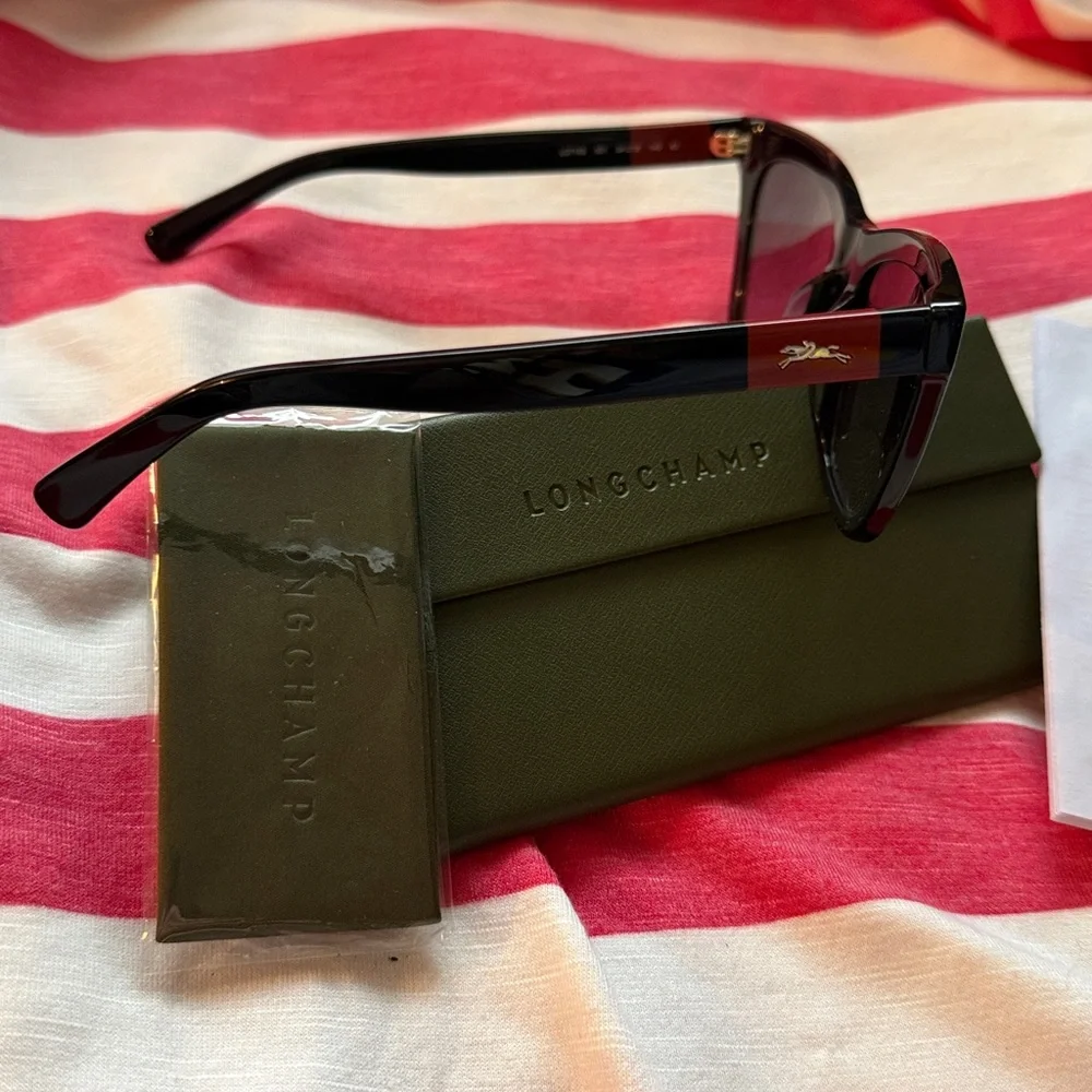 Longchamp 715S Women’s Black Cat-Eye Sunglasses with Purple Gradient Lenses NIC